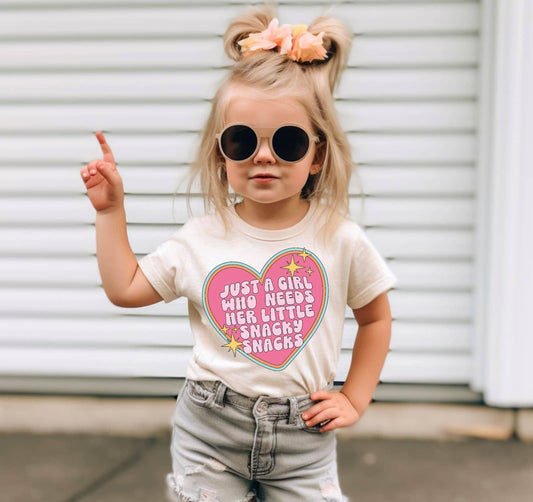 Just a girl who needs her little snacky snacks graphic tee 
